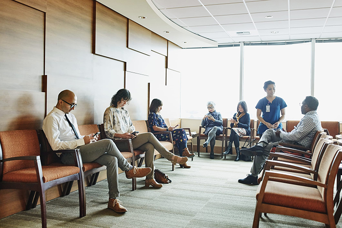 a waiting room full of people